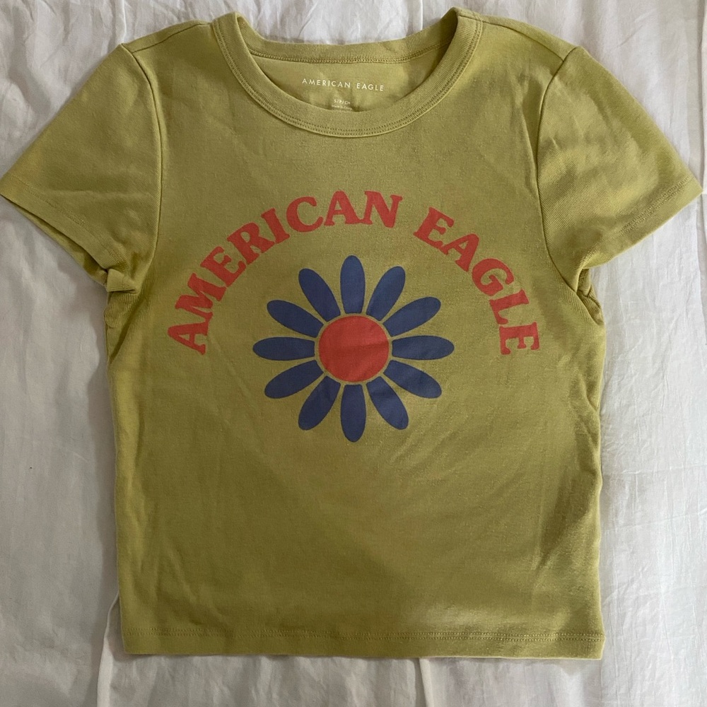The cutest baby tee from America Eagle🌼